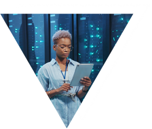 Acronis - Woman holding a notepad in a data center